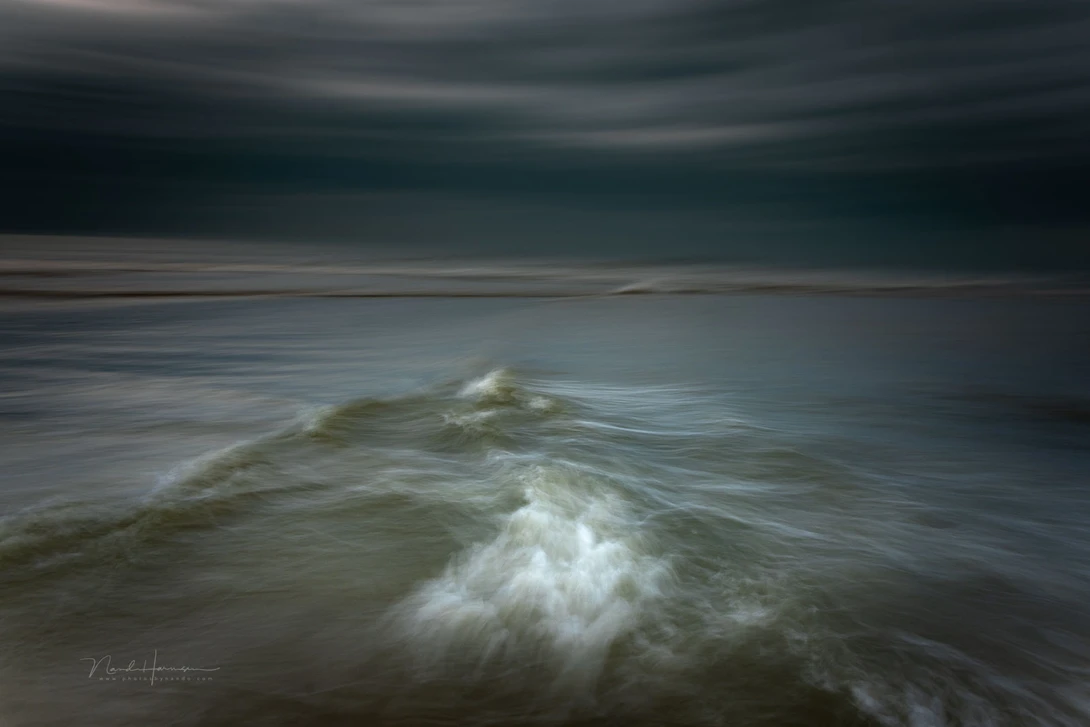 I try to find the place were waves meet. Especially under a cloudy sky. A lot of attempts to capture this will fail. But if you catch that one moment, it is rewarding.