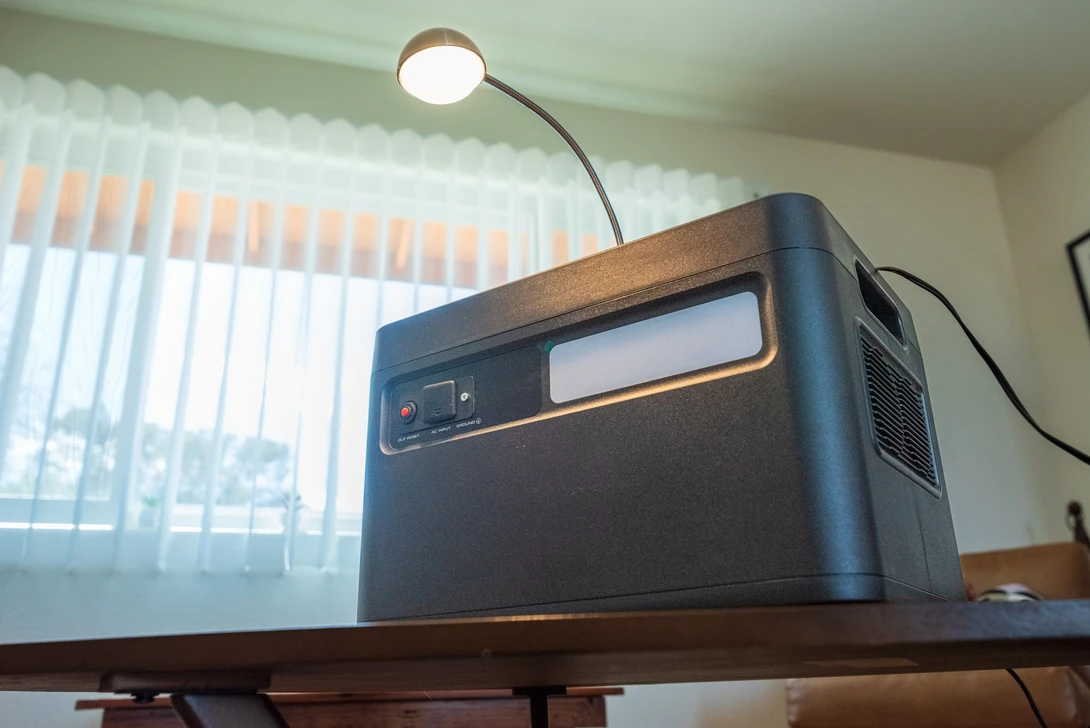 The back of the GRECELL H2400. From left to right, you can see the OLP (Overload Protector) Reset, AC Input, Earth (Ground) Terminal, and the surprisingly large LED light.