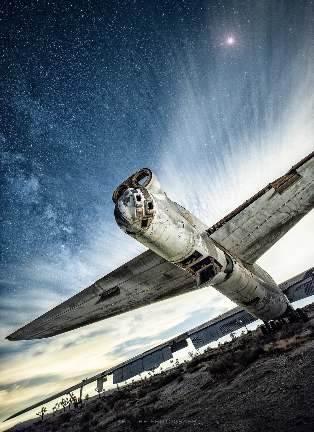 Abandoned airplane at night