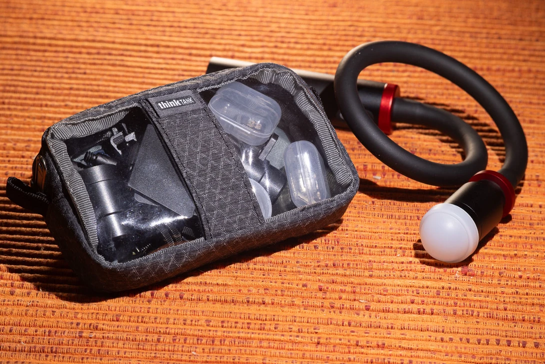 I used a Thinktank Cable Management 5 pouch for the accessories.&nbsp;