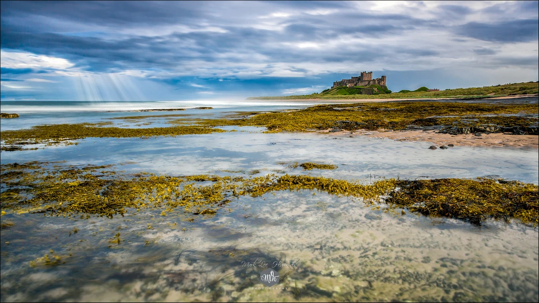 View Rays of Light at Bamburgh by Mark Heavisides