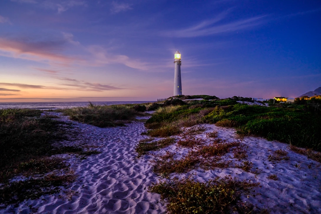 View Lighthouse at twilight, New Years Eve by Langa Ncayiyana