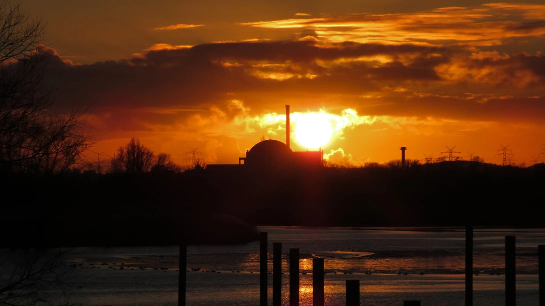 View sunset over nuclear power plant by Kandid Letters