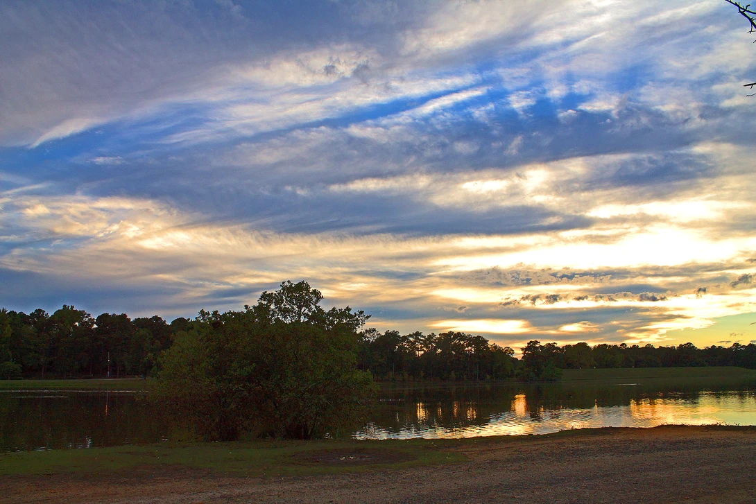 View Cooper Creek Park at Sunset by Thomas Vasas