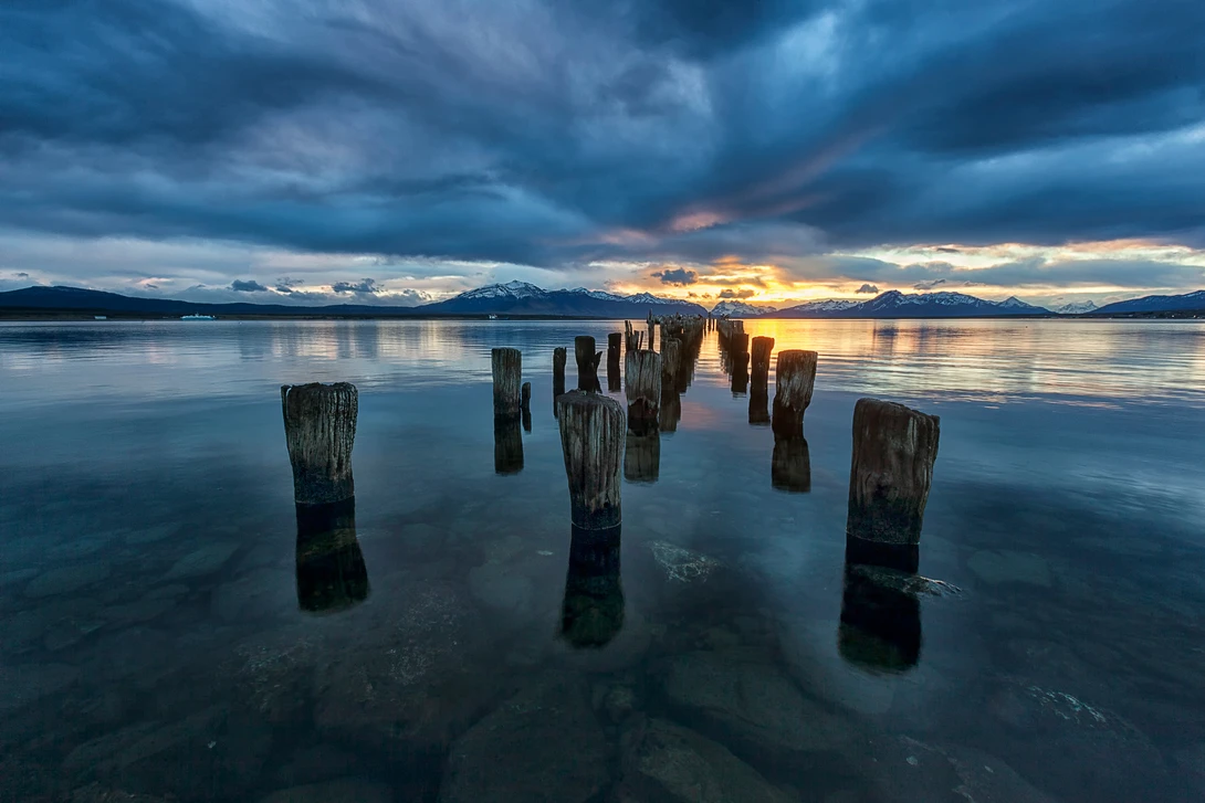 View Sunset at Puerto Natales by Andrea Torselli