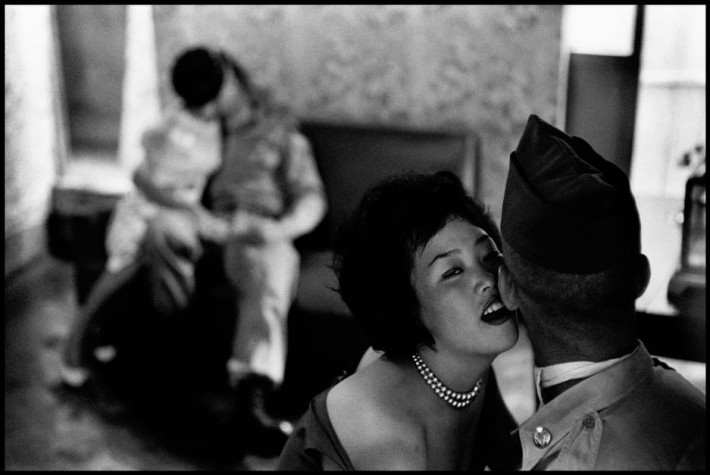 SOUTH KOREA. 1961. Village of Yon Sul Gol. Women entertaining GIs.